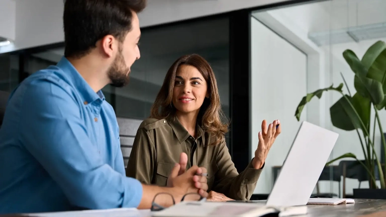 Two mortgage advisers talking